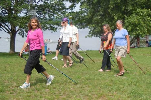 Kari Galasso demonstrates urban pole walking at a special workshop put on by the Sharbot Lake Family Health Team in Sharbot Lake